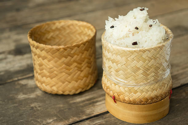 sticky rice 1 sticky white & red rice close up Buy Bamboo Sticky Rice Container for Easy Home Cooking stock pictures, royalty-free photos & images