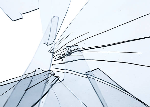 istock Broken glass fragments above white. Abstract background texture 178793289