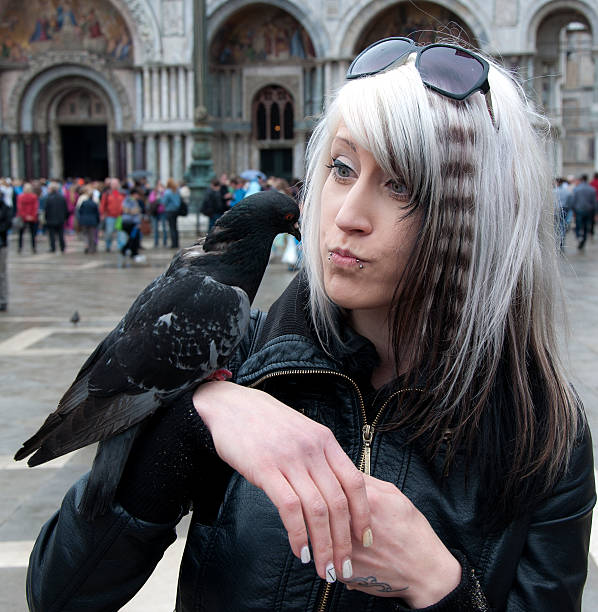 Young woman with pigeonYoung woman with pigeon