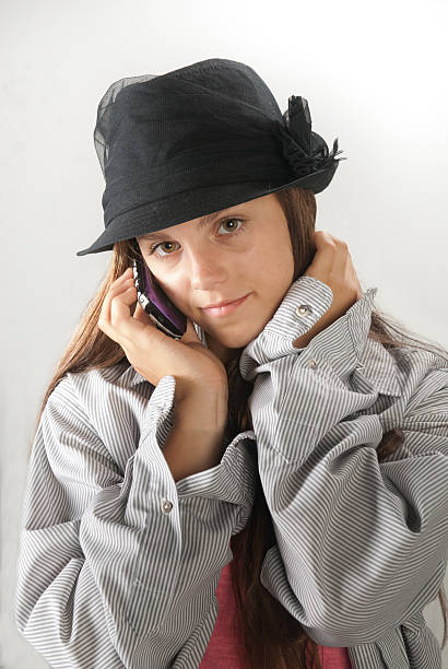 Teenage girl talking on cell phone stock photo