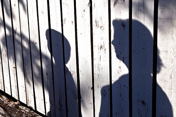 istock shadow of a boy with mother 178794055