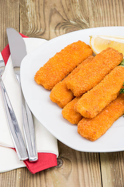 istock Portion of Fish Fingers on a plate 178794301