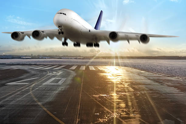 istock Passenger airplane landing on runway in airport 178794572