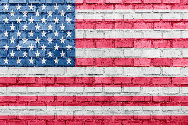 istock USA flag on a brick wall 178794860