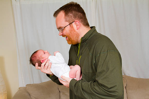 istock Father Holding His Newborn Baby Son 178796524
