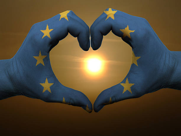 istock Heart and love gesture by hands colored in eu flag 178796614
