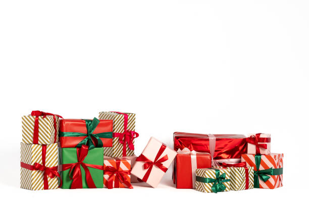 istock Beautifully wrapped Christmas presents isolated on white background 1787968294