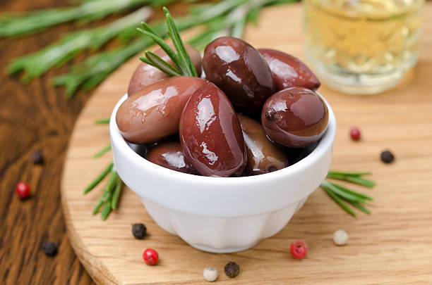 istock kalamata olives and spices on a wooden board 178798310