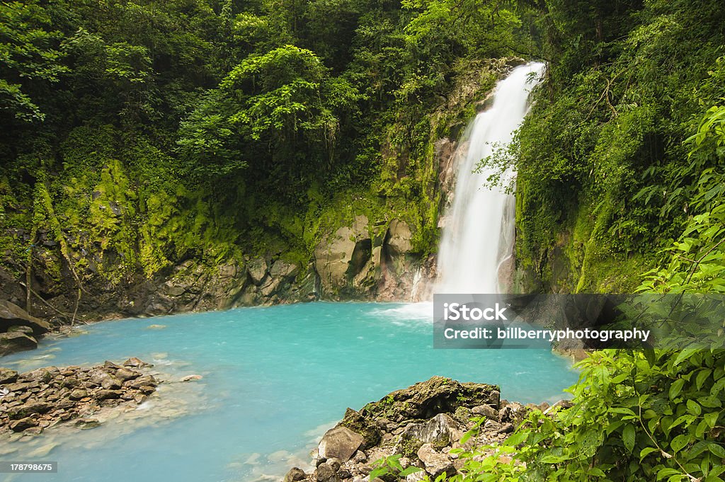 Waterfall-Rio Celested Small waterfall on the Rio Celeste in Costa Rica. Costa Rica Stock Photo