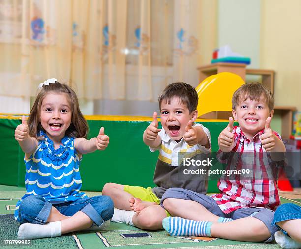 Excited Children Holding Thumbs Up Stock Photo - Download Image Now - Thumbs Up, Preschool Student, Child