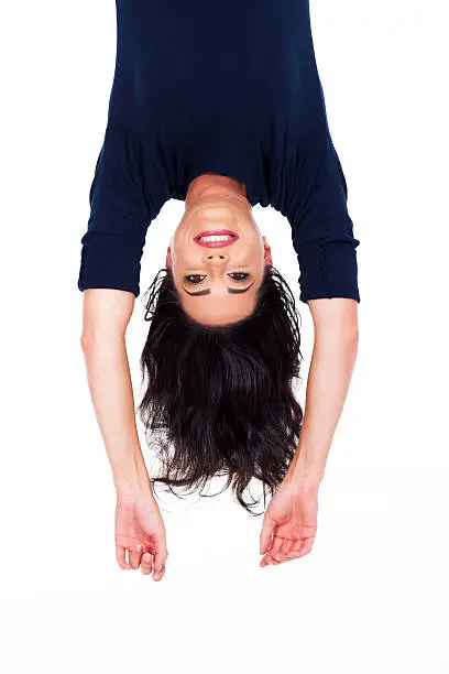 Photo of pretty woman upside down