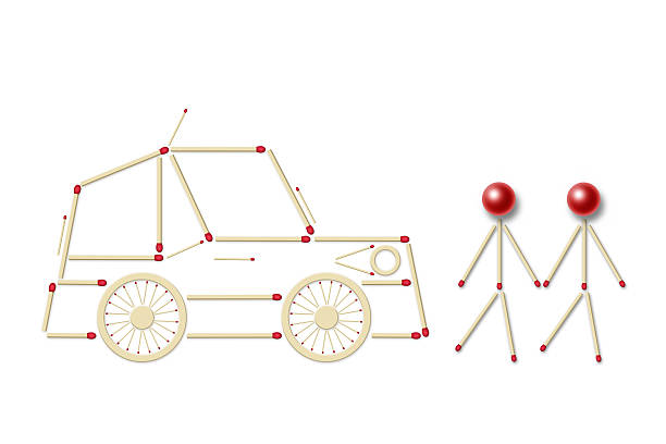 little men and little assembled of red matches, a symbol of a danger for children on the road