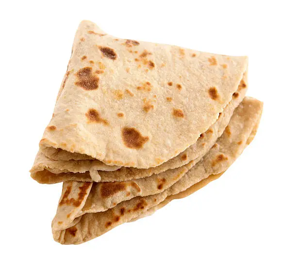 "Chapati, chapathi, chapatti or flatbread, famous indian basic food isolated on white background."