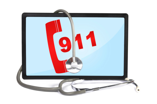 stethoscope and  touchpad with 911 symbol