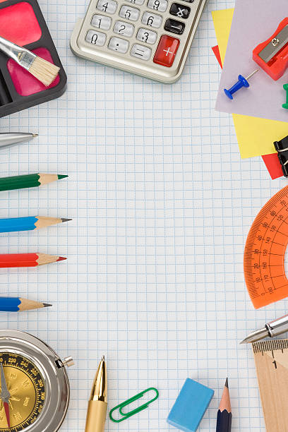 istock school supplies on  checked paper 178802630