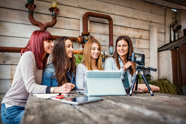 istock Four friends doing a vlog video together. 1788026488