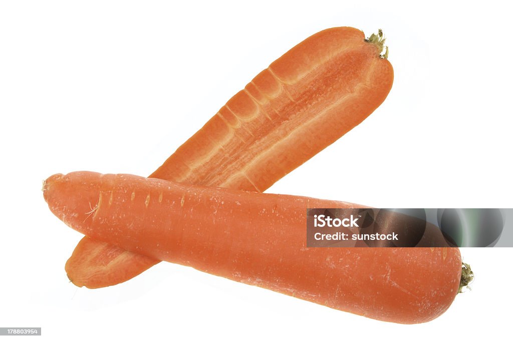 Halves of Carrot Halves of Carrot on White Background Carrot Stock Photo