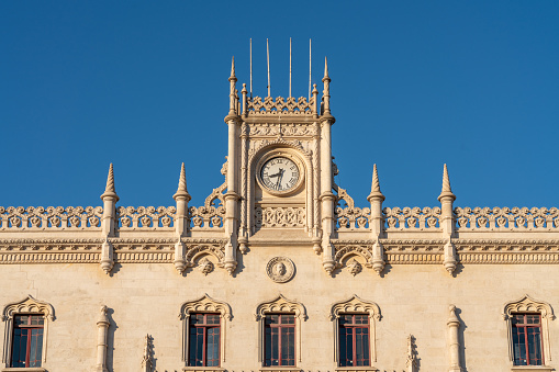 Gibraltar, Gibraltar - 13 november 2014: Top view of main bus station with  huge old clock in the foreground