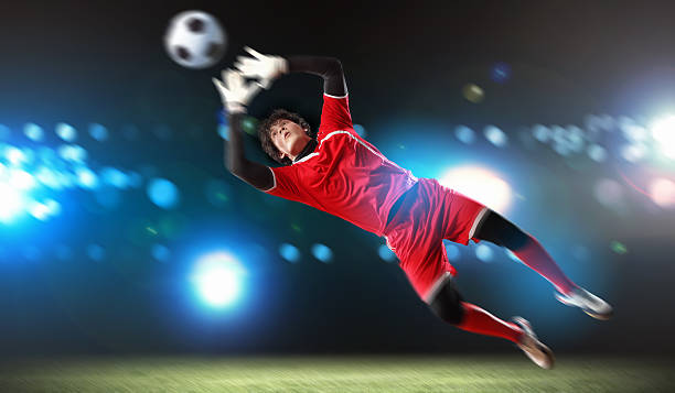 istock Goalkeeper catches the ball 178804539