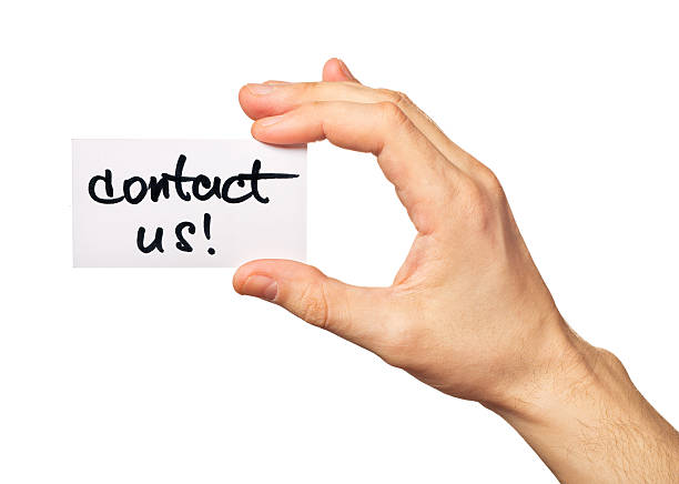 istock Male hand points on a card Contact Us 178804692
