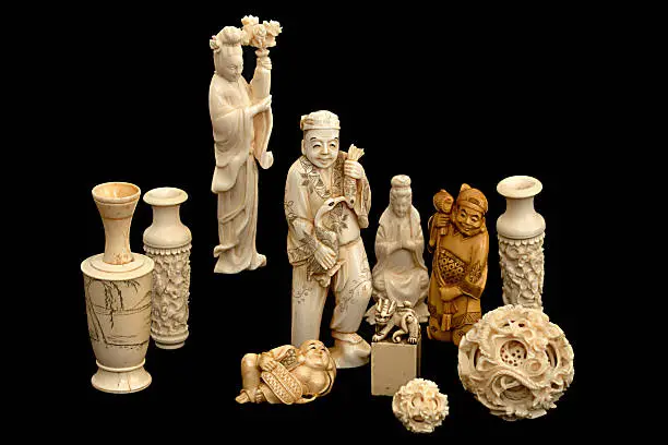 A group of japanese chinese ivory carvings okimono