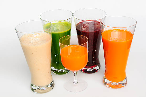 Five glasses of smoothies stock photo
