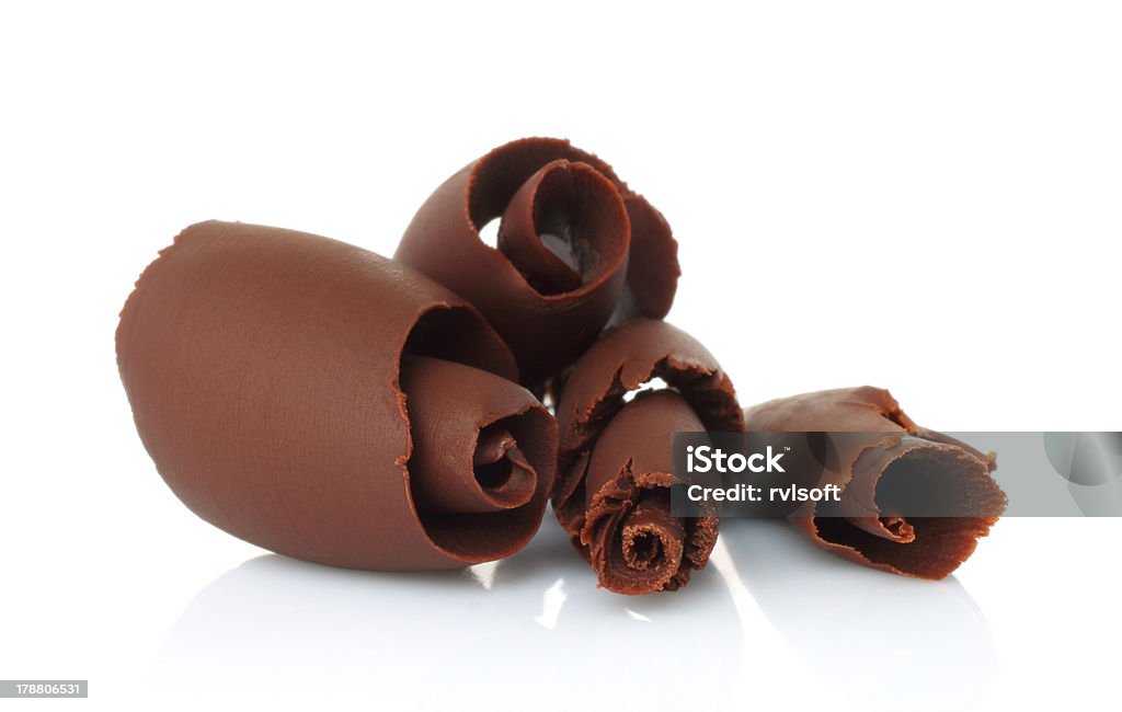 Chocolate shavings Chocolate shavings on white background Blob Stock Photo