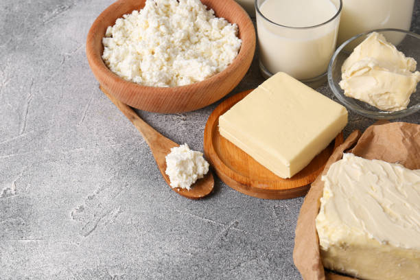istock Tasty homemade butter and dairy products on grey table. Space for text 1788071004