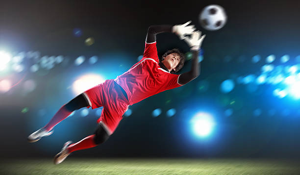 istock Goalkeeper catches the ball 178807170