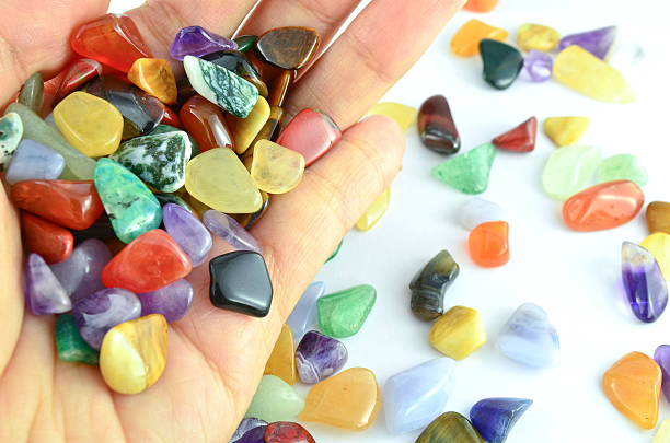 istock Hand holding colorful stones 178808258