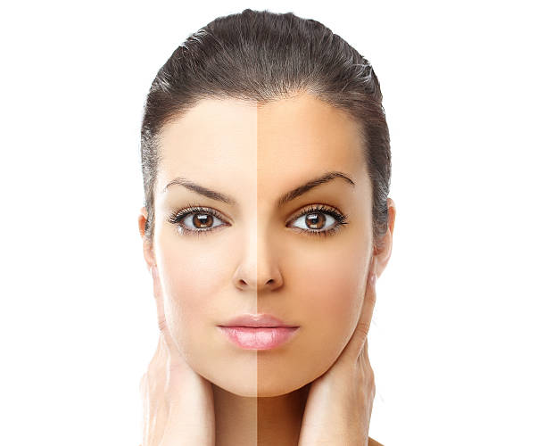 istock Model's face divided in two parts - tanned and natural. 178808559