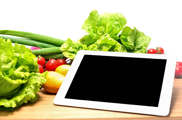 istock fruits Vegetables variety and digital tablet 178810242
