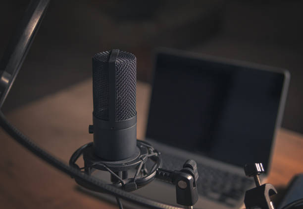 istock Interior of a home studio for podcasts. Large Microphone, notebook and notebooks on table. Interior. Closeup 1788106072