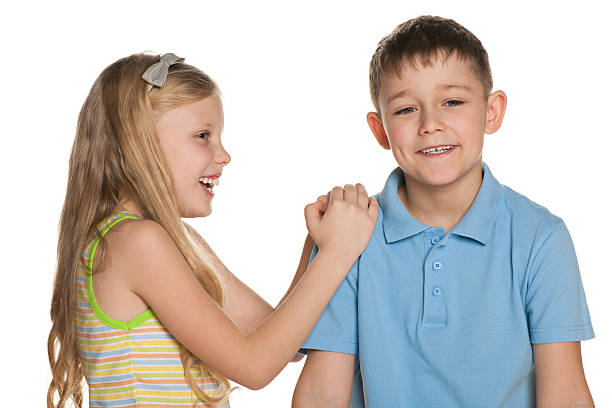 istock Laughing  boy and  girl are standing together 178810826