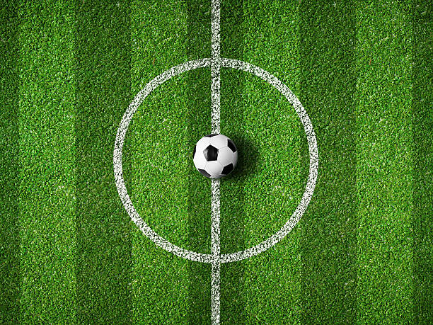istock soccer field center and ball top view background 178811301