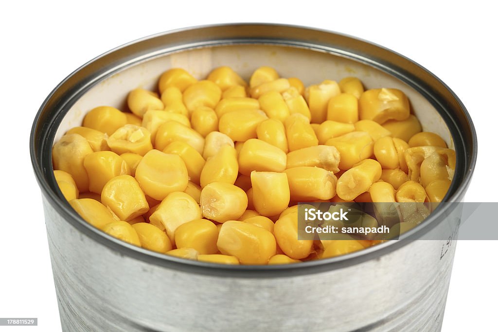 Canned Corn Canned Corn. Isolated with clipping path. Airtight Stock Photo