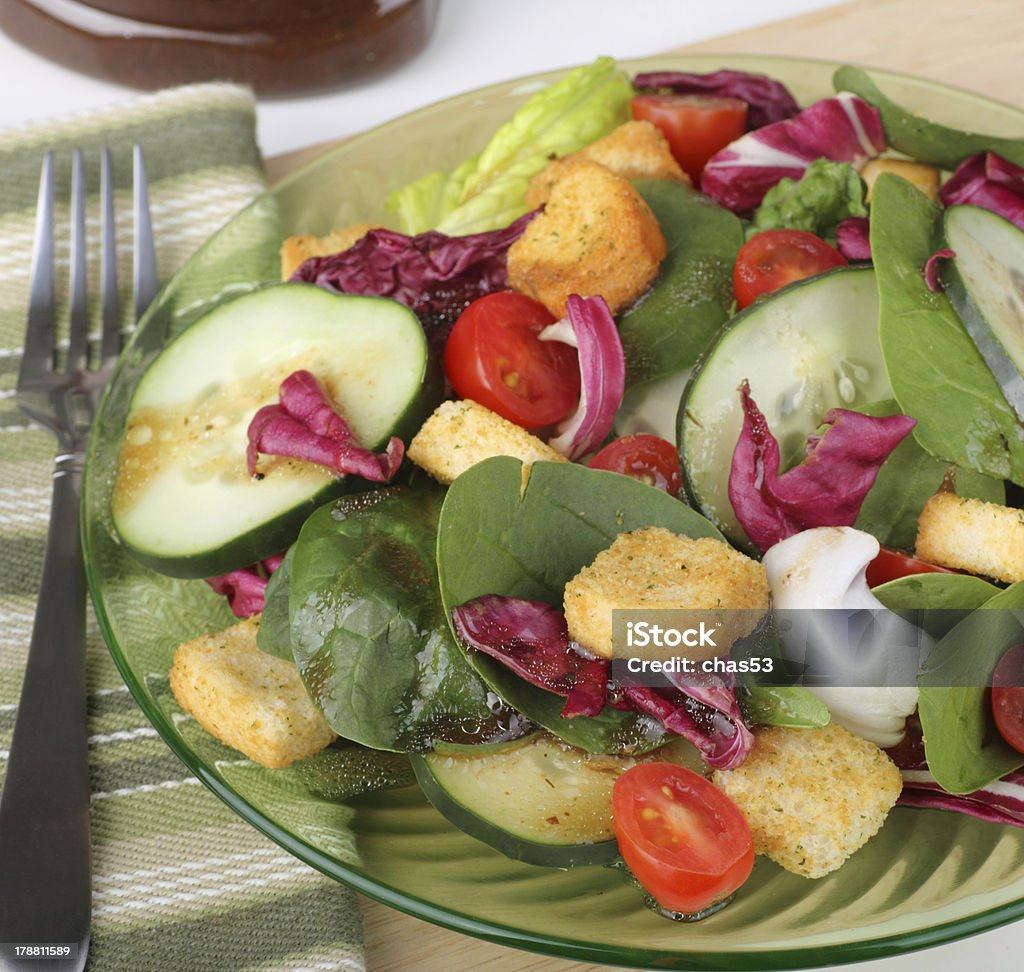 Nutritious Salad Salad with baby spinach, cucumbers, tomatoes and croutons Crouton Stock Photo