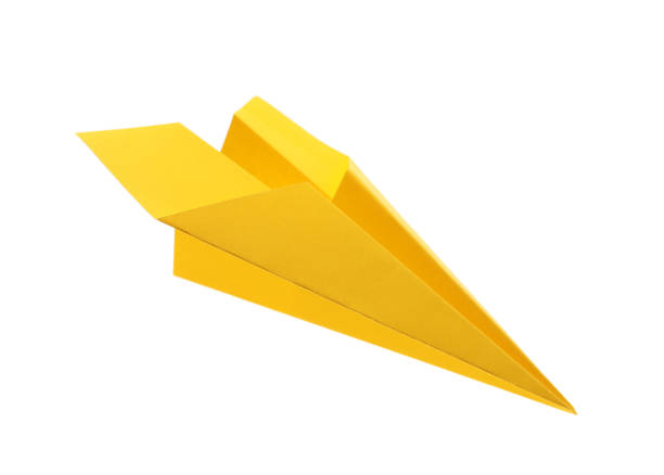 istock Handmade yellow paper plane isolated on white 1788120012