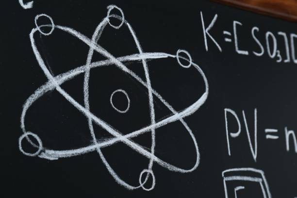 istock Different mathematical formulas written with chalk on blackboard, closeup 1788124626
