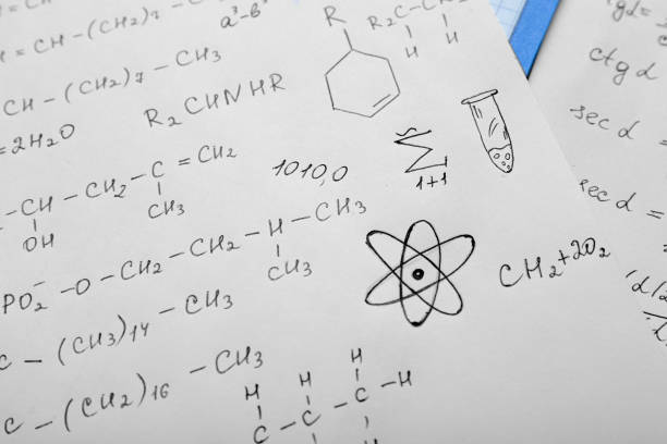 istock Sheets of paper with different chemical formulas, closeup 1788126259