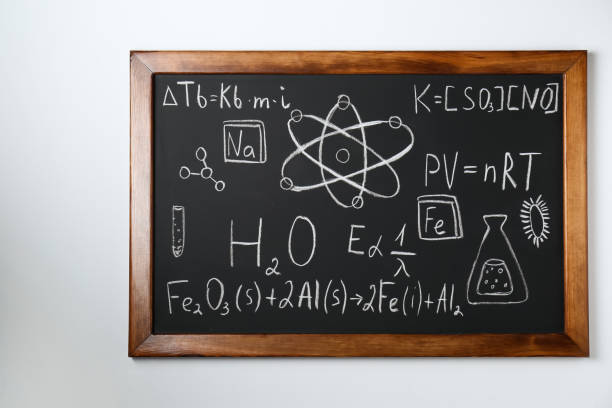 istock Blackboard with different chemical formulas written with chalk on white wall 1788126784