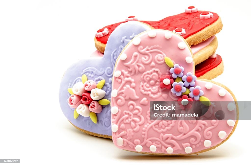 Valentine cookies Valentine cookies decorated with heart shape surrounded by white background Baked Pastry Item Stock Photo