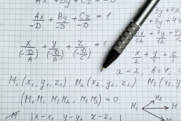 istock Sheet of paper with different mathematical formulas and pen, top view 1788127864
