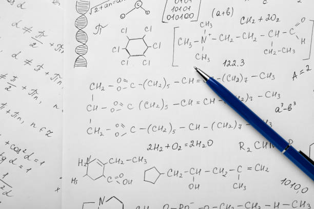istock Sheets of paper with different chemical formulas and pen, top view 1788128955