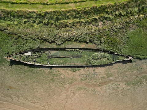 An aerial view of the wreckage of a post medieval steam dredger in River Deben