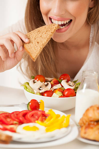 istock Woman eating healthy breakfast. 178813457