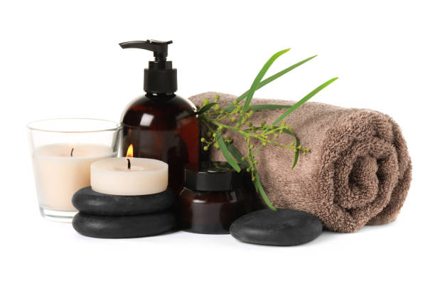 istock Beautiful spa composition with burning candles and different care products on white background 1788135292