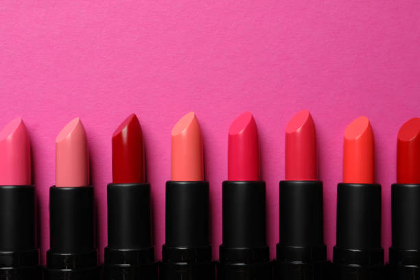 istock Beautiful lipsticks on pink background, flat lay. Space for text 1788144828