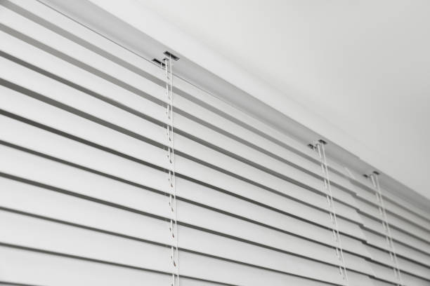 istock Closeup view of horizontal blinds on window indoors 1788145363