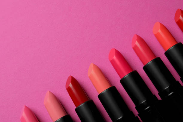istock Beautiful lipsticks on pink background, flat lay. Space for text 1788145884